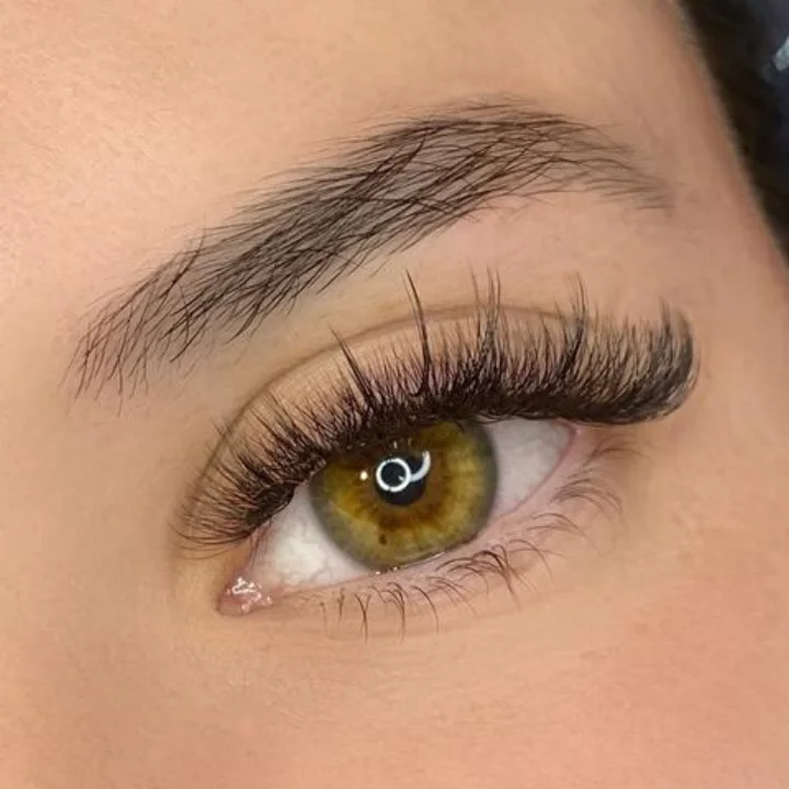 Close-up of a textured wispy set designed to resemble strip lashes